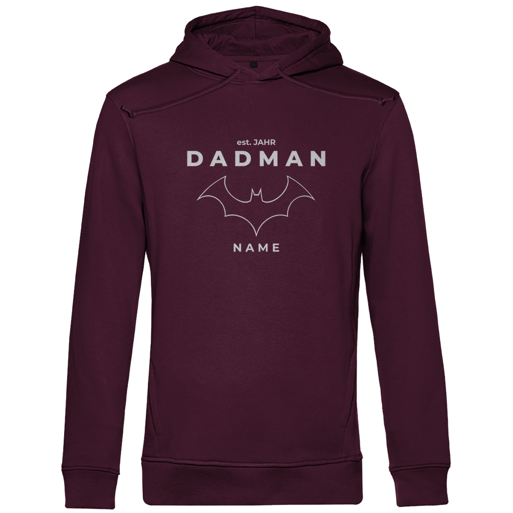 Hoodie Herren „Superheld Origins“ personalisierbar aus Bio-Baumwolle in Burgundy Weinrot – zurückhaltendes Superhelden-Design mit Kapuze, Kängurutasche und Statement für Väter