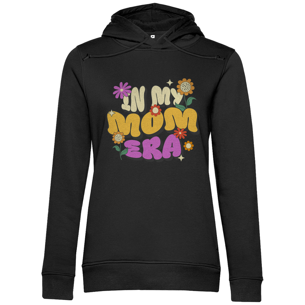 Damen Hoodie in Schwarz aus Bio-Baumwolle mit Retro-Motiv „In My Mom Era“ und bunten Blumen. Nachhaltig und stylisch.