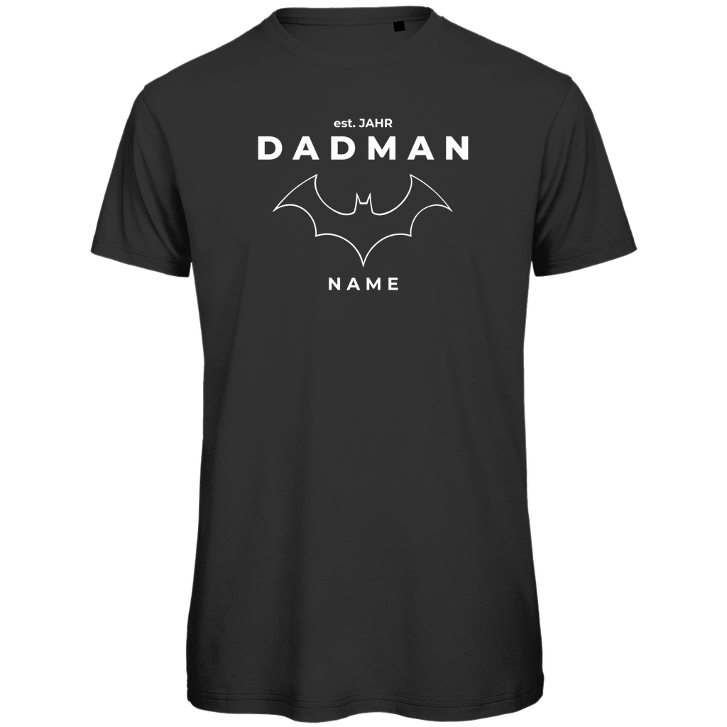 T-Shirt Herren „Superheld Origins“ personalisierbar aus Bio-Baumwolle in Schwarz – zurückhaltendes Superhelden-Design für Väter mit Namen und Geburtsjahr
